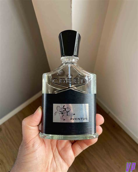 creed aventus in hand